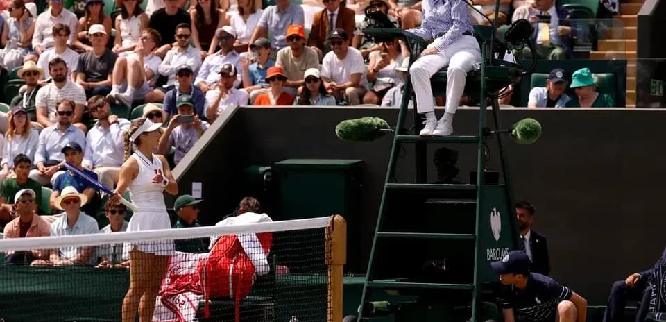 Tennis match with player and umpire at Wimbledon