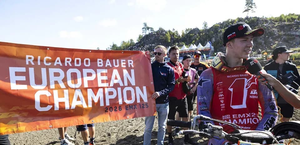 Ricardo Bauer celebrating European Championship win with banner