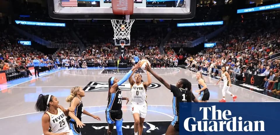 Basketball players competing for a rebound during game