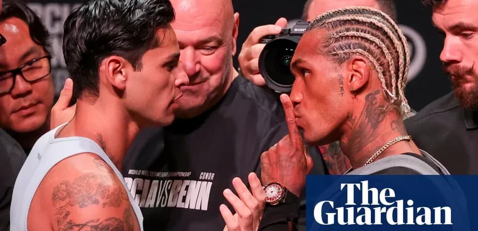 Two boxers facing off at weigh-in event