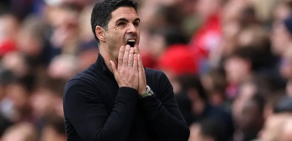 Manager reacting during a tense moment in match