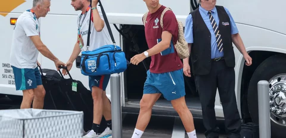 Cristiano Ronaldo arriving with team staff at bus