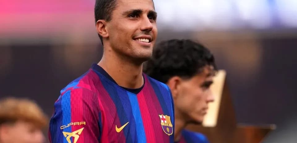 Barcelona player smiling during trophy celebration