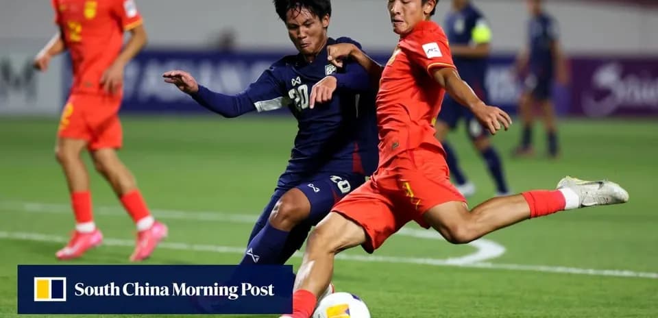 Two players challenging for the ball during match