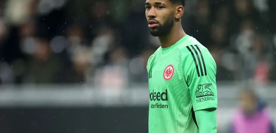 Goalkeeper in green kit during match
