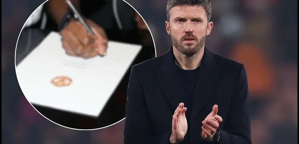 Michael Carrick applauding with contract signing in background
