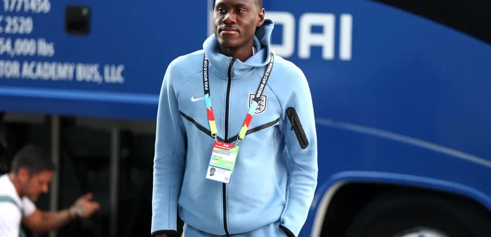 Player arriving at team bus before match