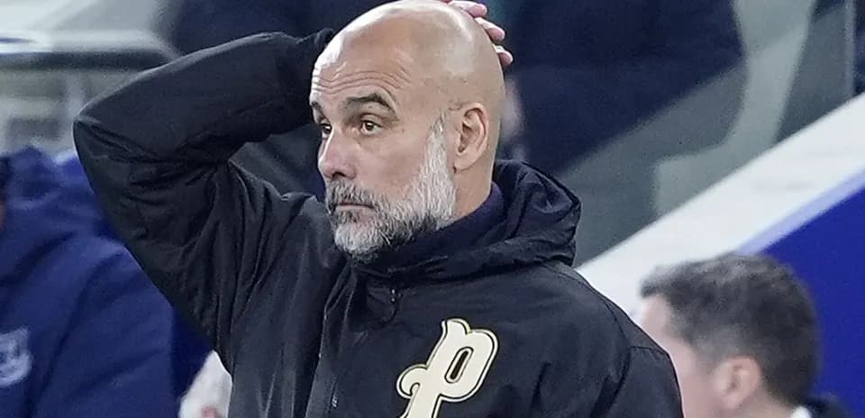 Football coach observing match from sidelines