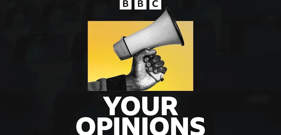 Hand holding a megaphone on yellow background
