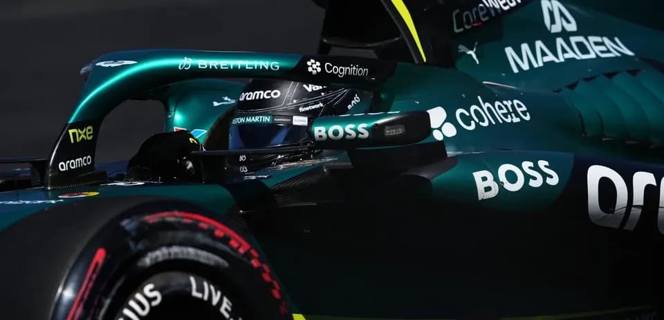 Formula 1 car racing on track with driver