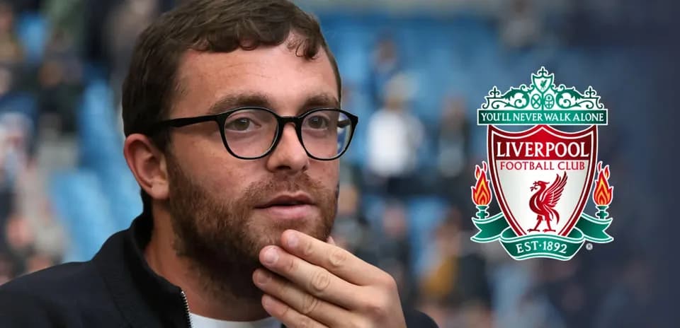Shirted man with glasses at Liverpool match