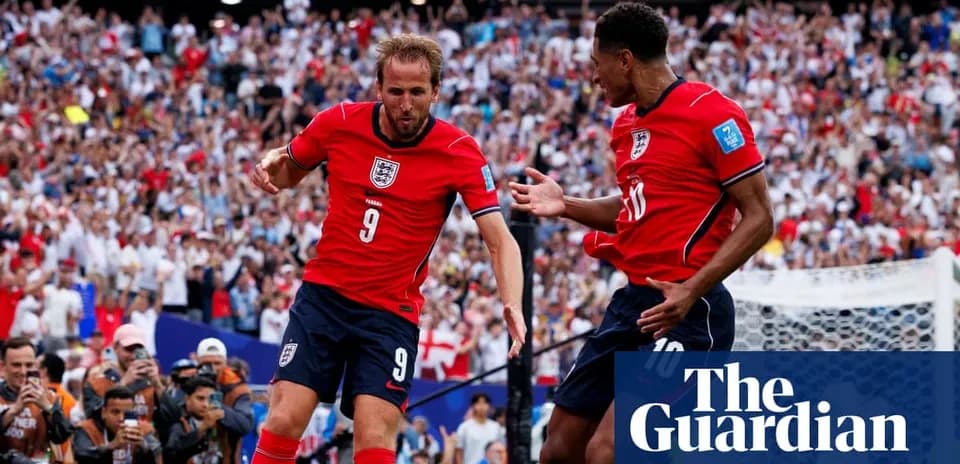 Harry Kane celebrating a goal with teammate