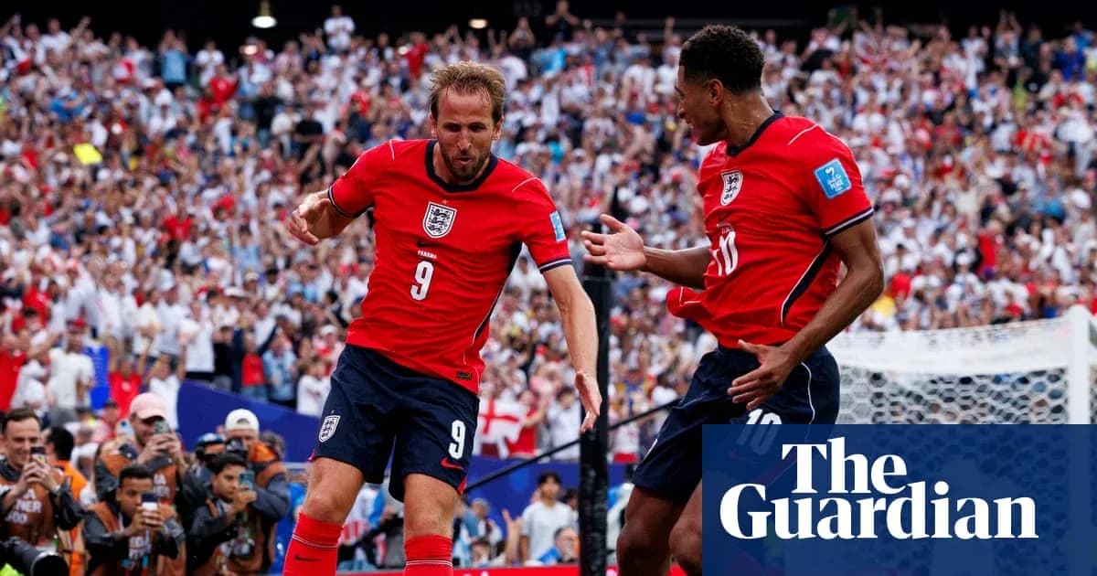 Harry Kane celebrating a goal with teammate