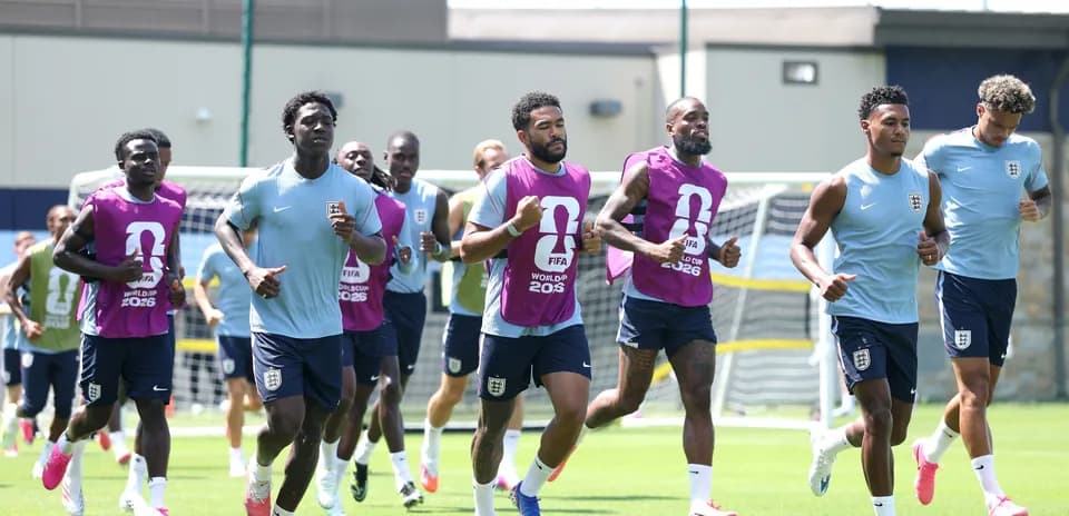 England team running during training session on pitch
