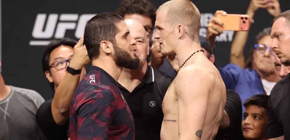 Fighters facing off during UFC weigh-in event