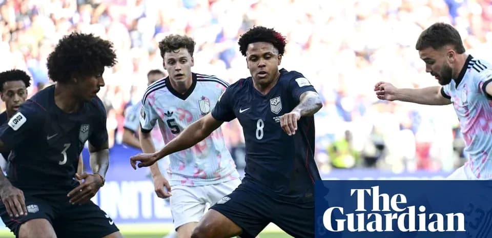US players competing for the ball in match