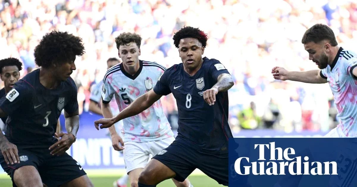 US players competing for the ball in match