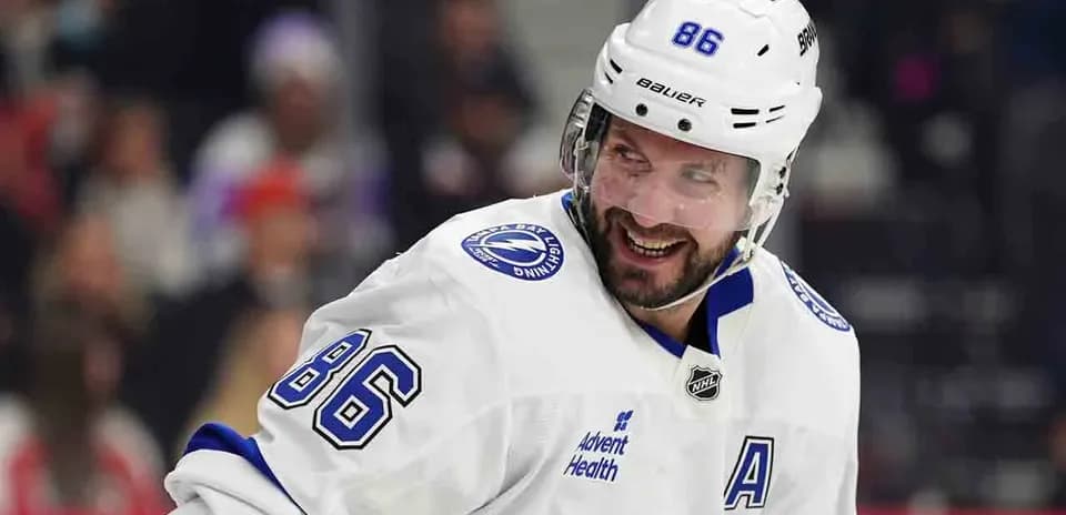 Hockey player smiling during game on ice