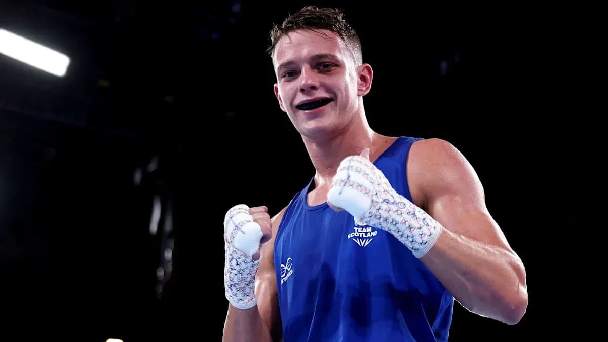 Boxer celebrating victory in blue uniform