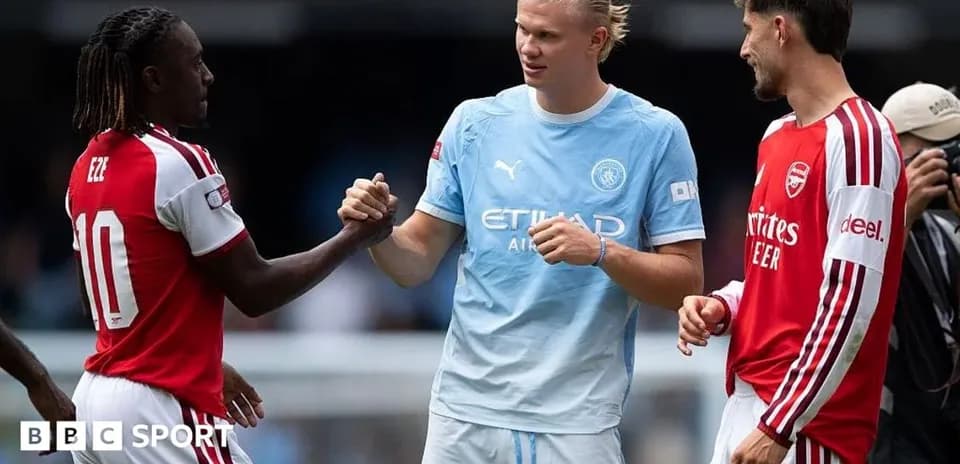 Three players shaking hands before the match