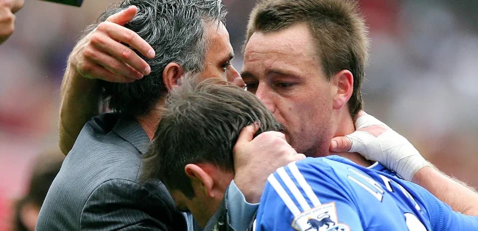 Coaches and players embracing after a match