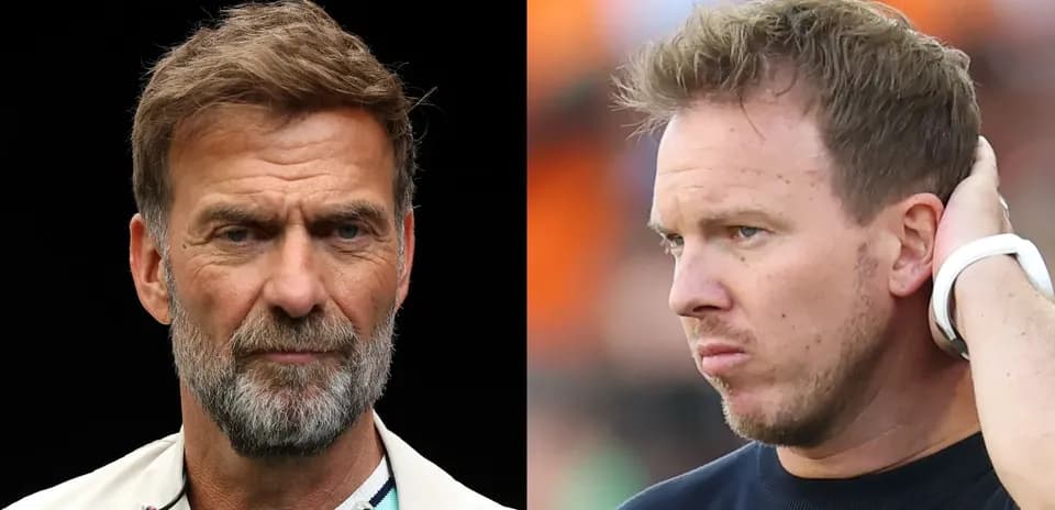 Two football managers on the sidelines during match