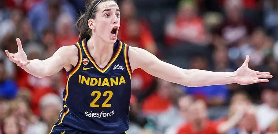 Basketball player gesturing during game action