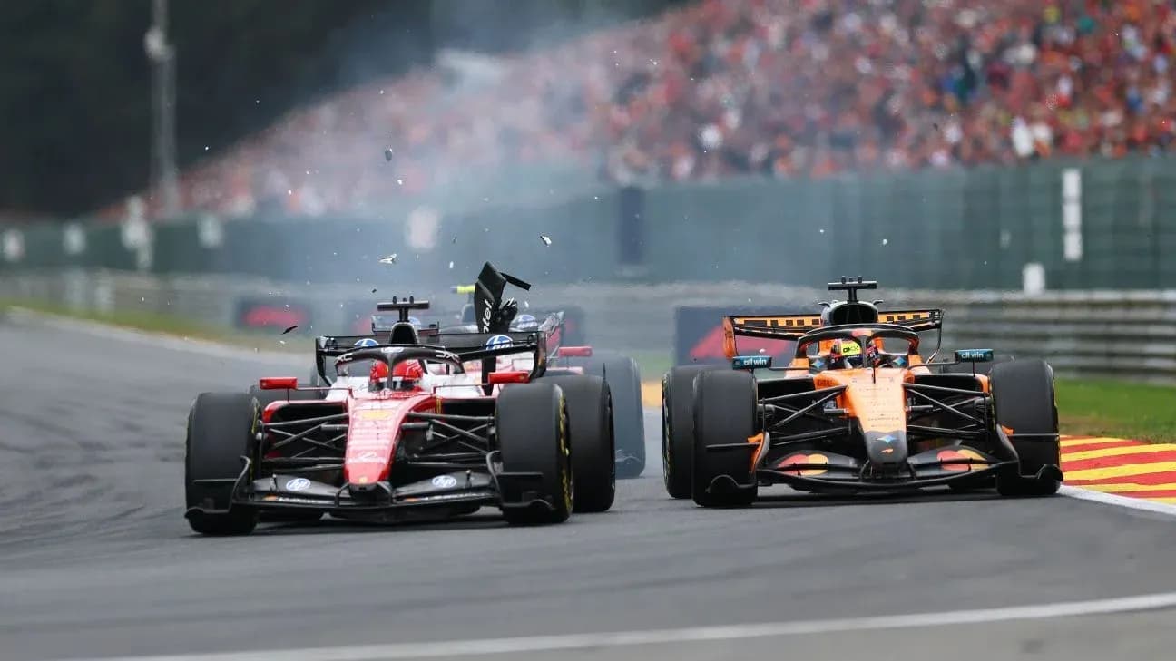 Ferrari and McLaren cars colliding on track