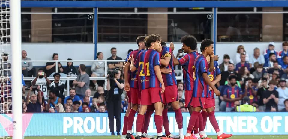 Barcelona players celebrating a goal together