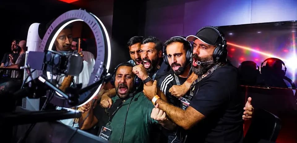 Commentators celebrating during an esports event