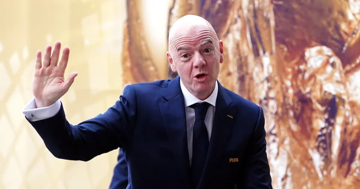 FIFA president gesturing during an event FIFA president gesturing during an event