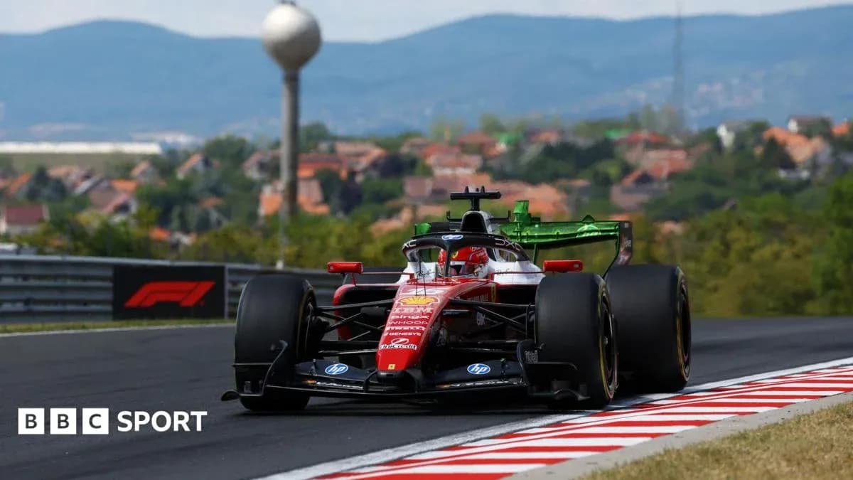 Ferrari Formula 1 car racing on track Ferrari Formula 1 car racing on track