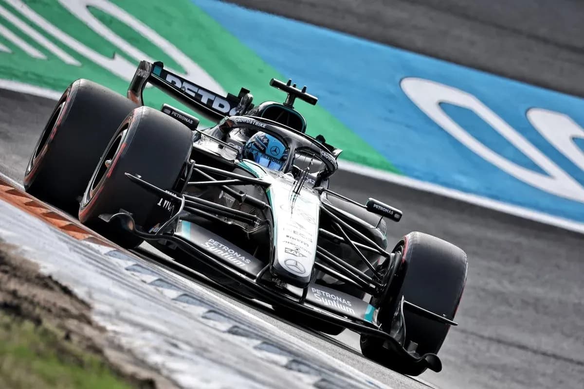 Formula 1 car racing on track during event Formula 1 car racing on track during event