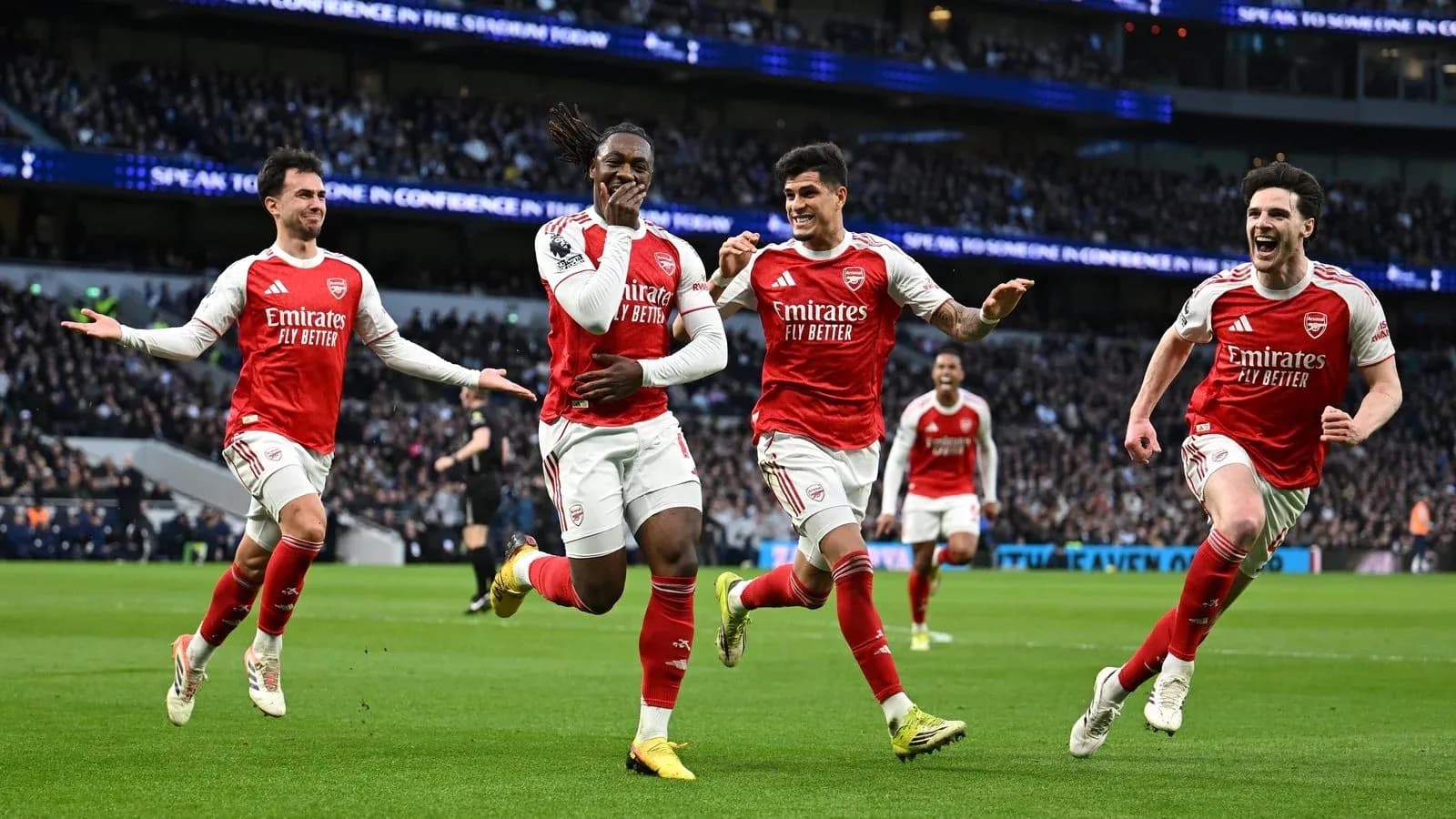 Arsenal players celebrating a goal during match Arsenal players celebrating a goal during match