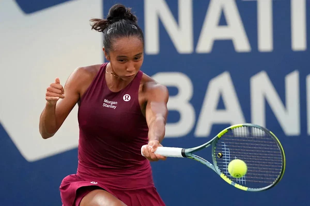 Tennis player hitting a ball during match Tennis player hitting a ball during match