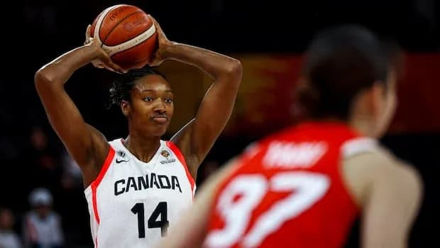 Canada player preparing to pass the basketball Canada player preparing to pass the basketball