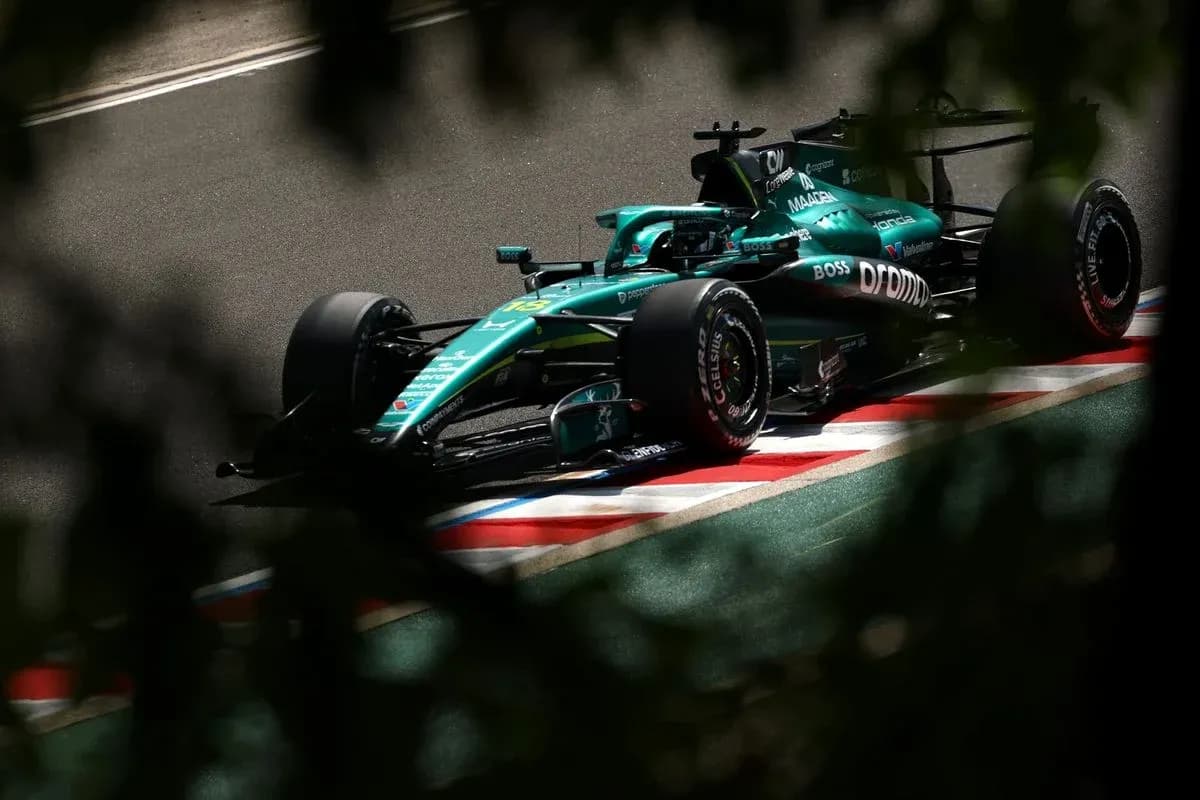 Aston Martin Formula 1 car on the track Aston Martin Formula 1 car on the track