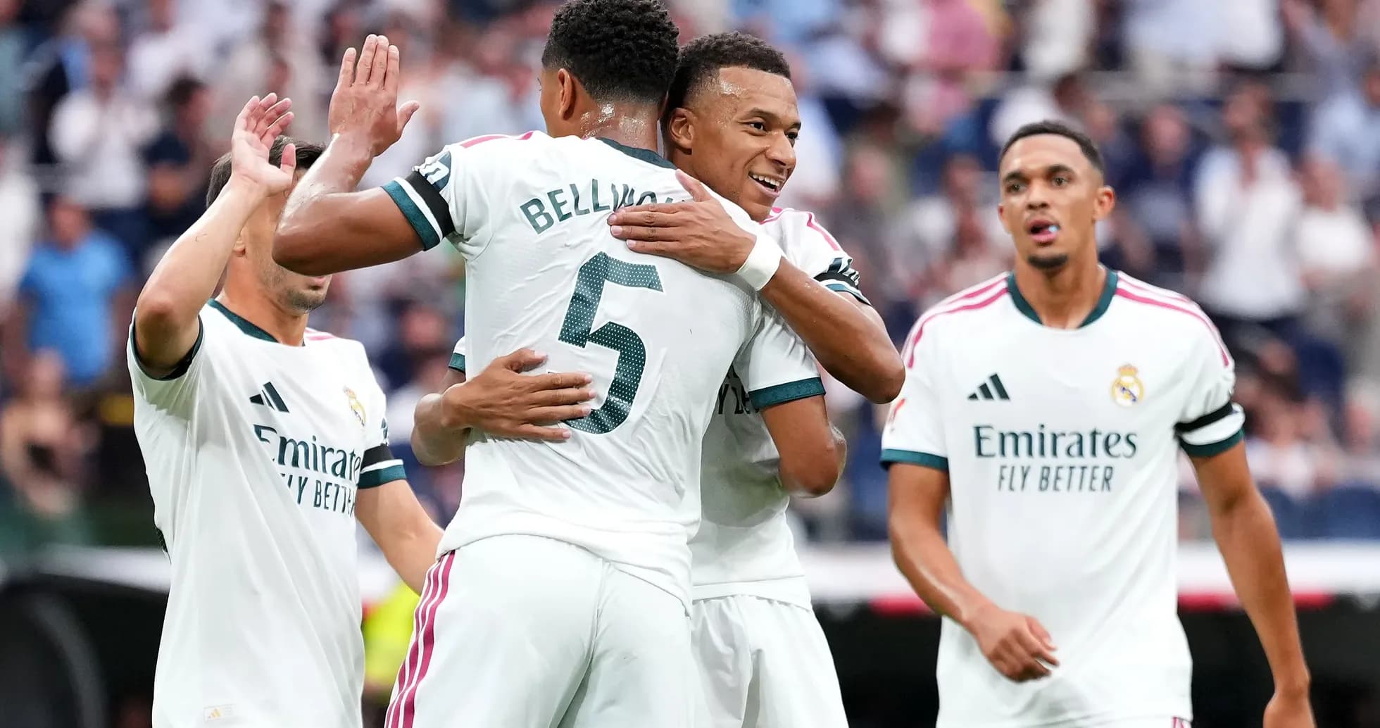 Real Madrid players celebrating a goal together Real Madrid players celebrating a goal together