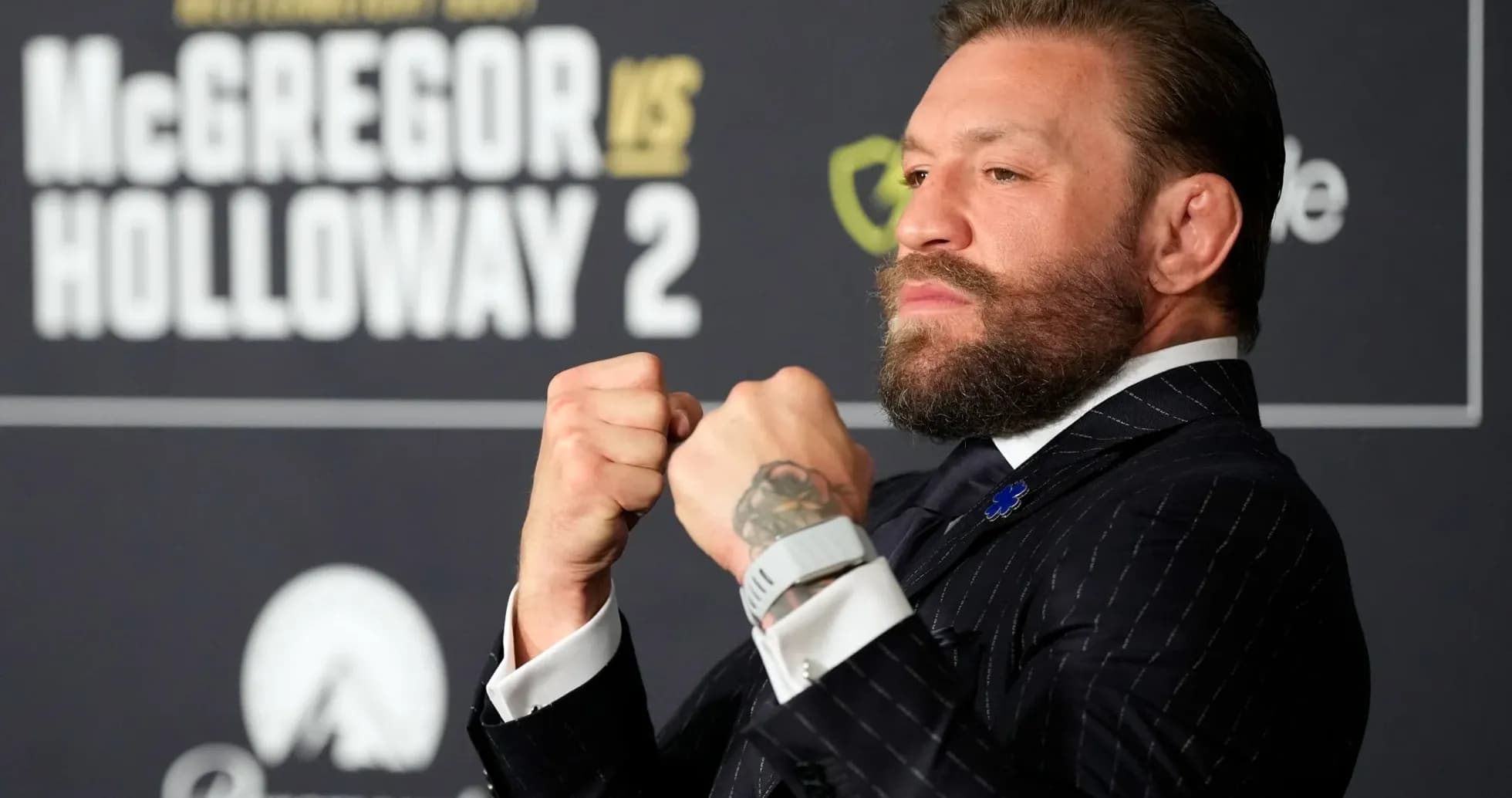 Conor McGregor posing at press conference for fight Conor McGregor posing at press conference for fight