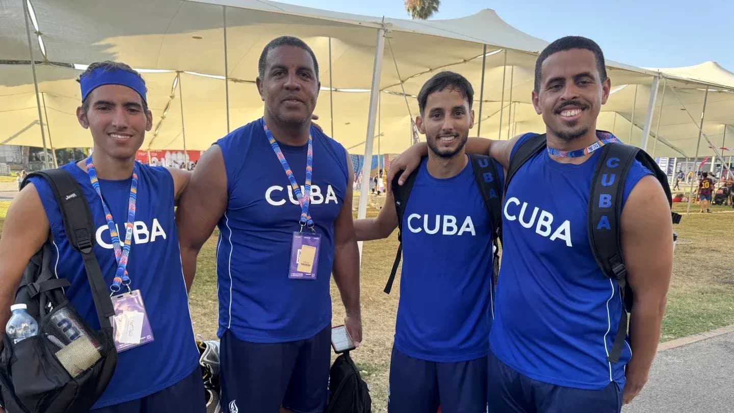 Cuban team members posing together in sportswear Cuban team members posing together in sportswear
