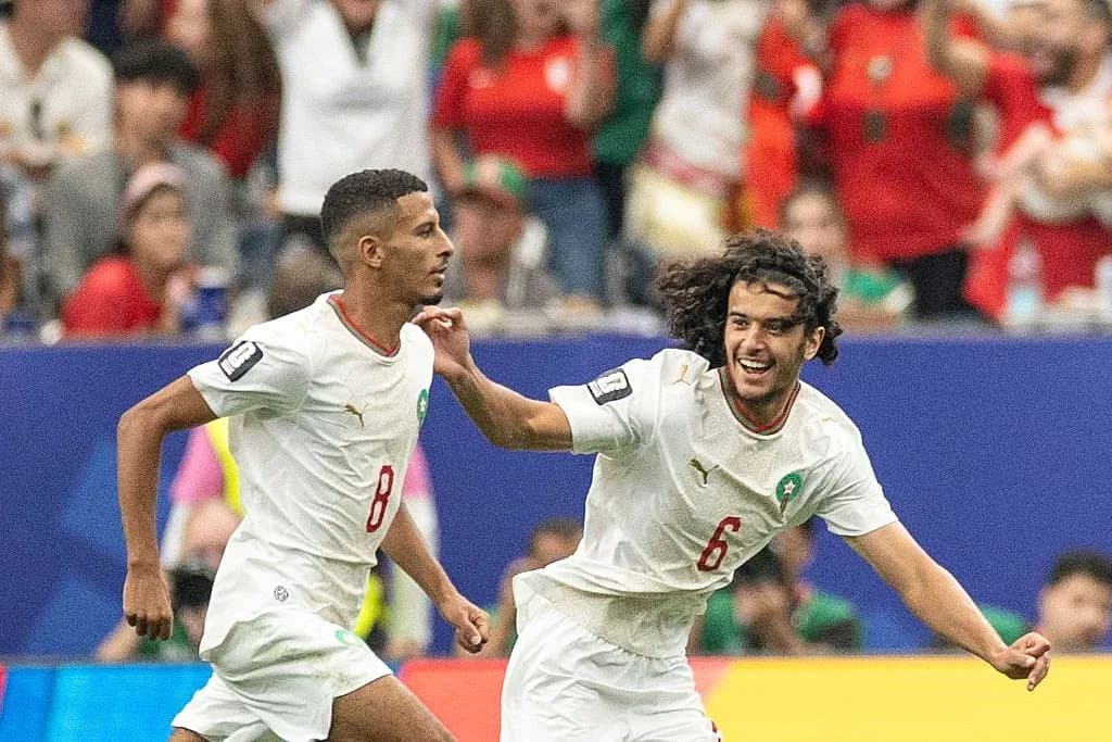 Morocco players celebrating a goal during match Morocco players celebrating a goal during match