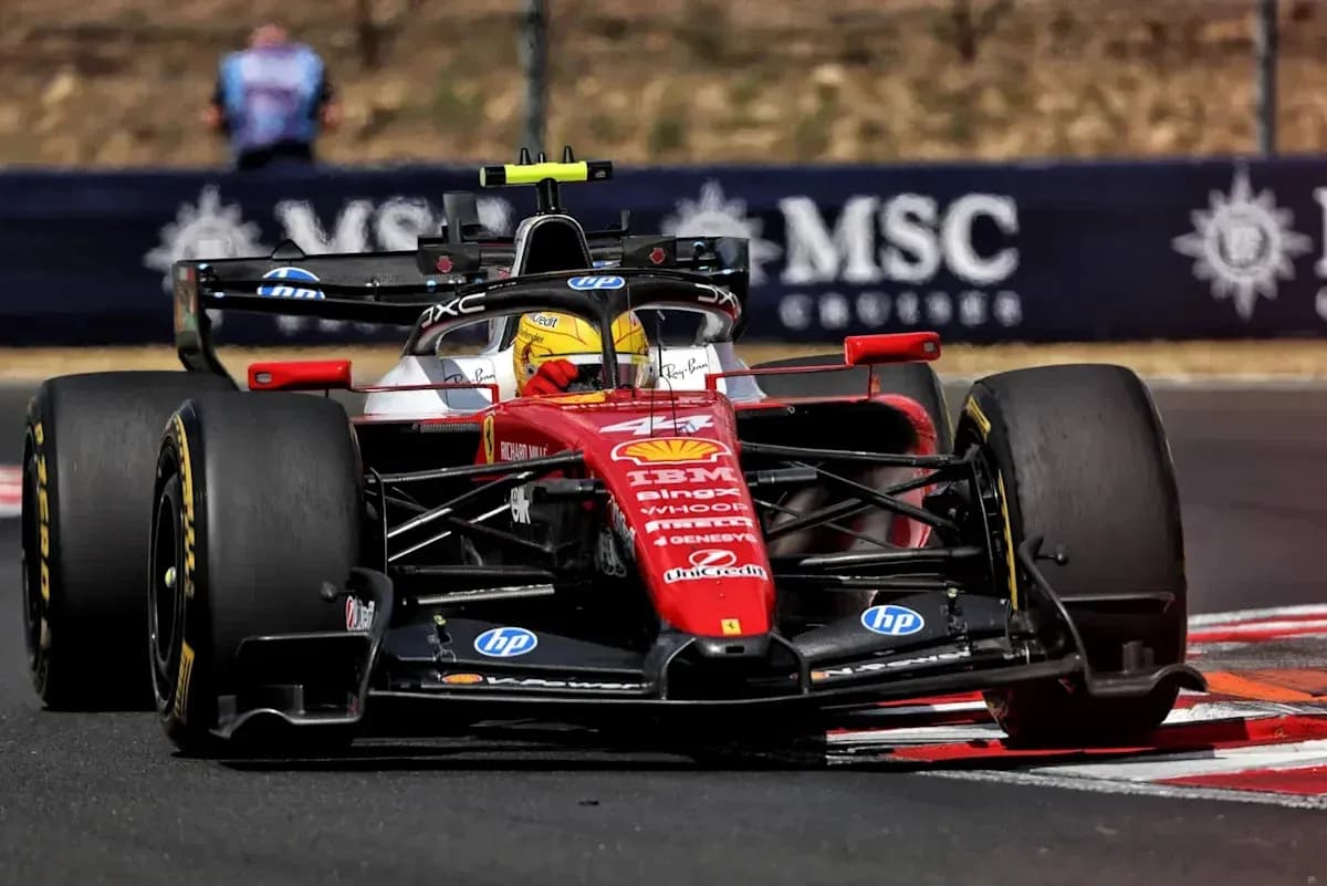 Formula 1 car racing on track during event Formula 1 car racing on track during event