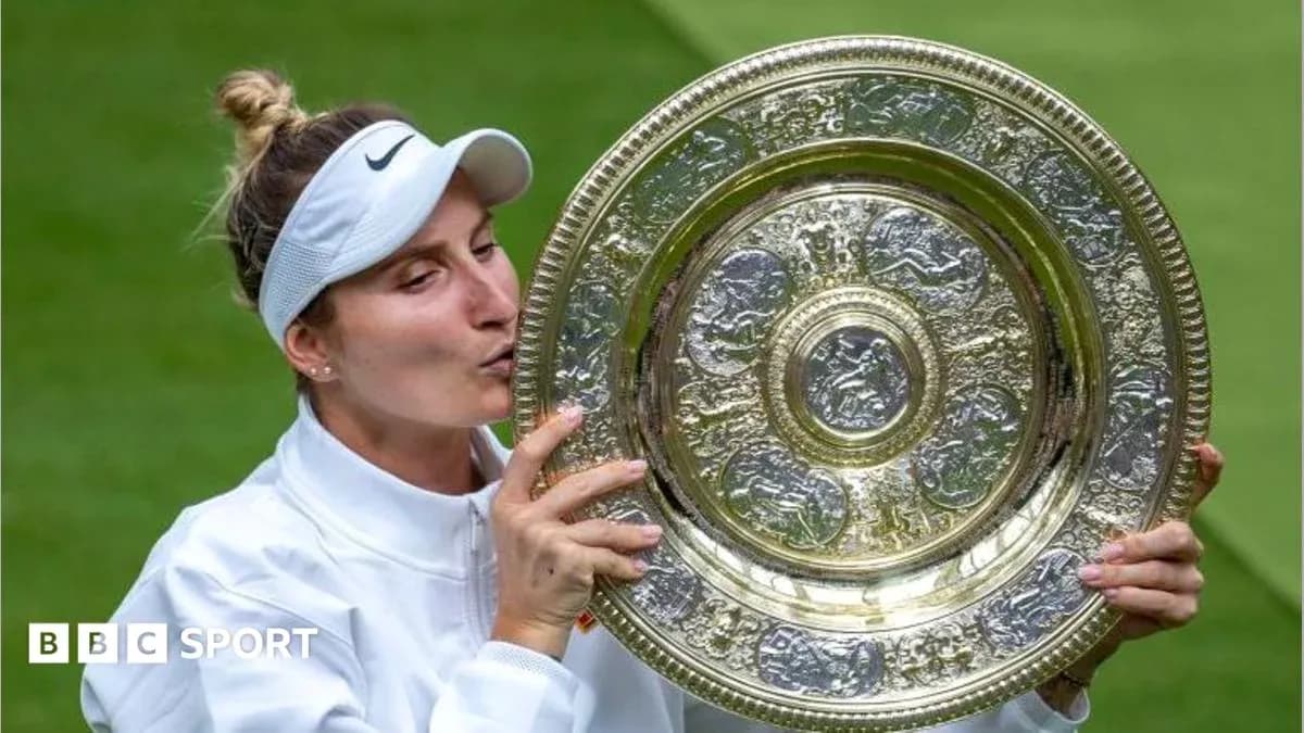 Tennis player kissing championship trophy on court Tennis player kissing championship trophy on court