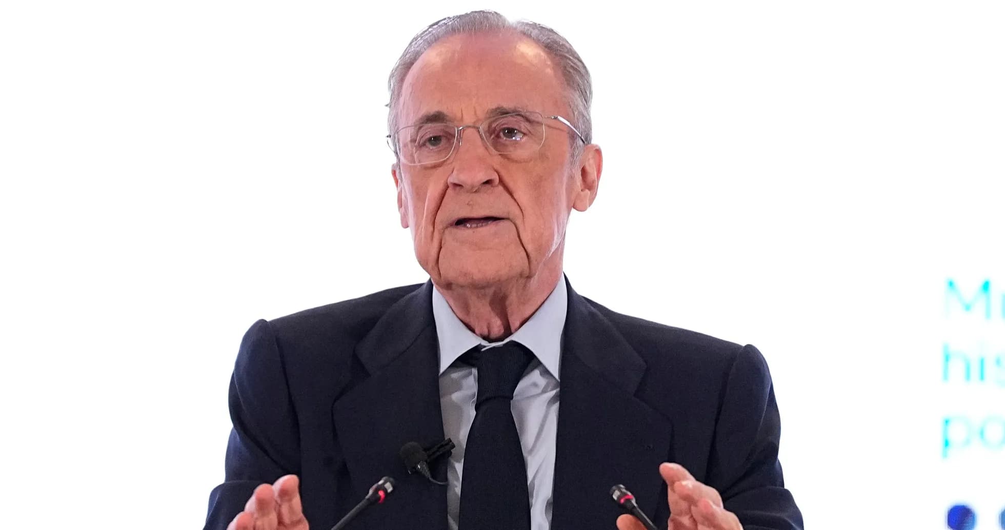 Person speaking at a podium during an event Person speaking at a podium during an event