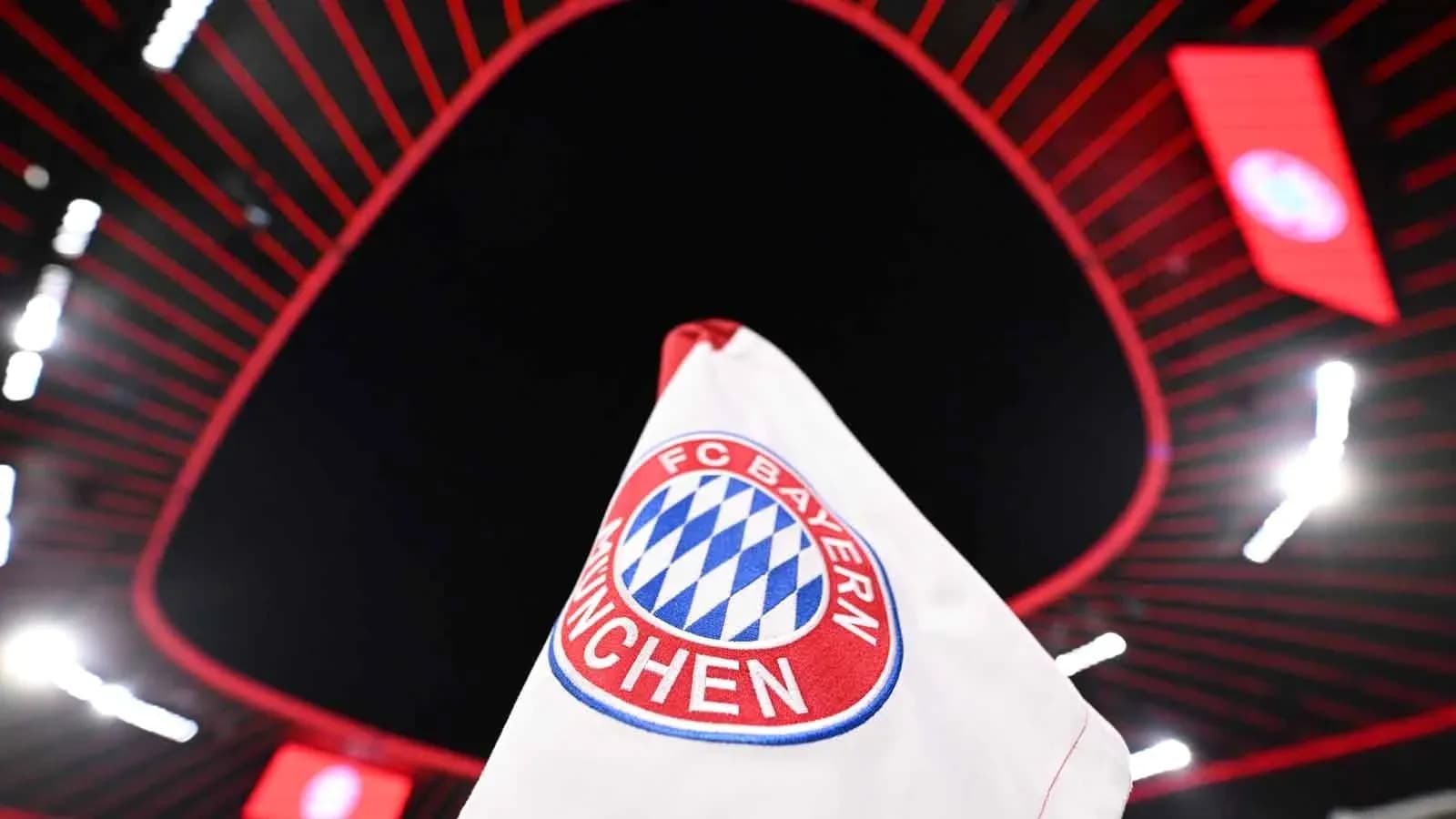 FC Bayern München flag in stadium lights FC Bayern München flag in stadium lights
