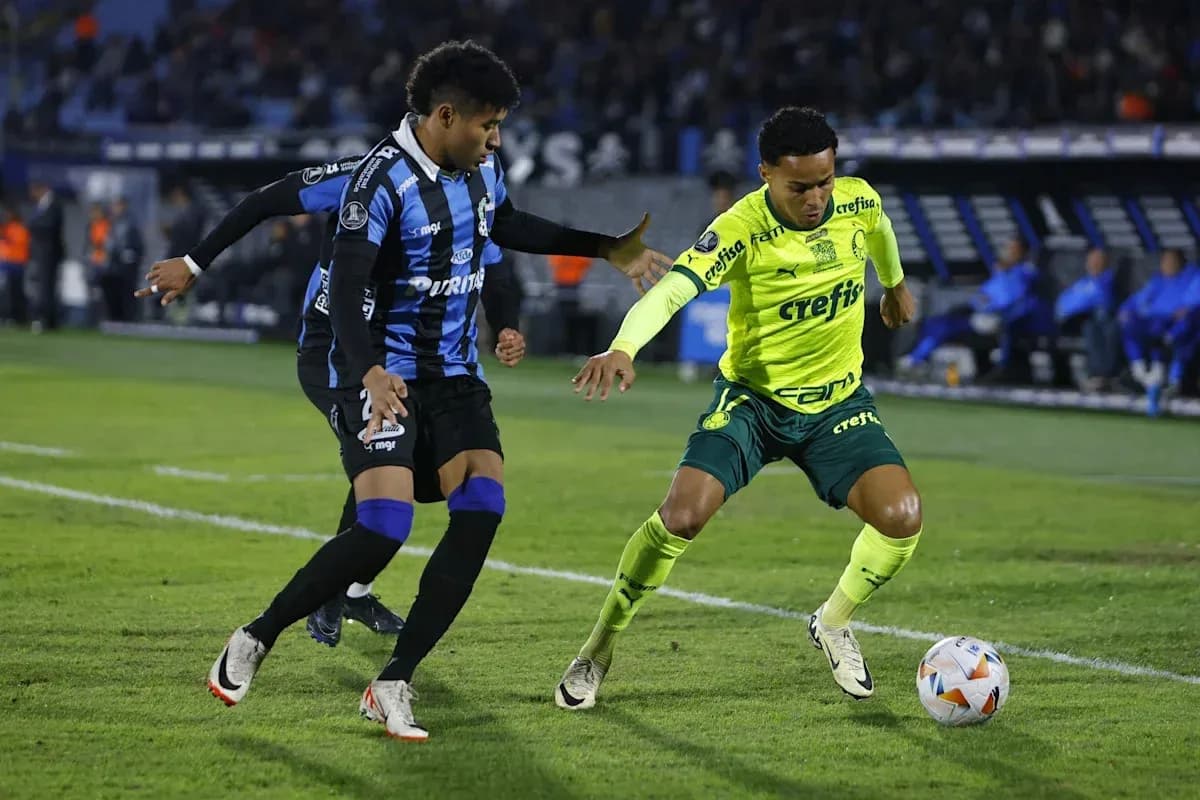 Two players competing for the ball during match Two players competing for the ball during match
