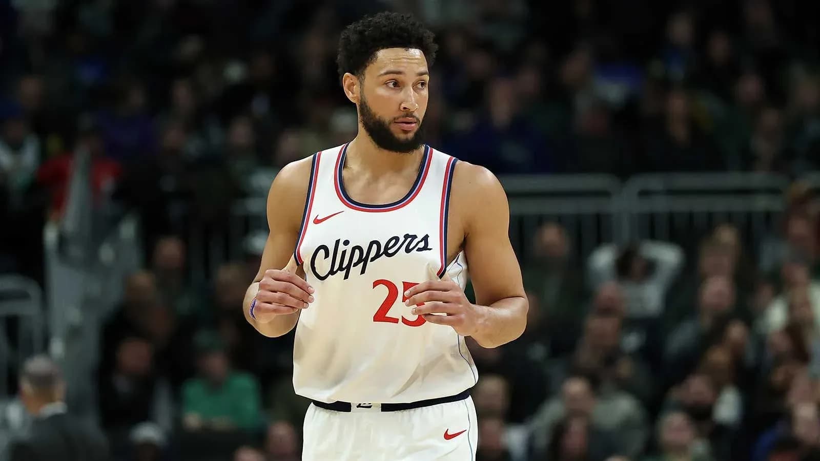 Basketball player in Clippers uniform on court Basketball player in Clippers uniform on court