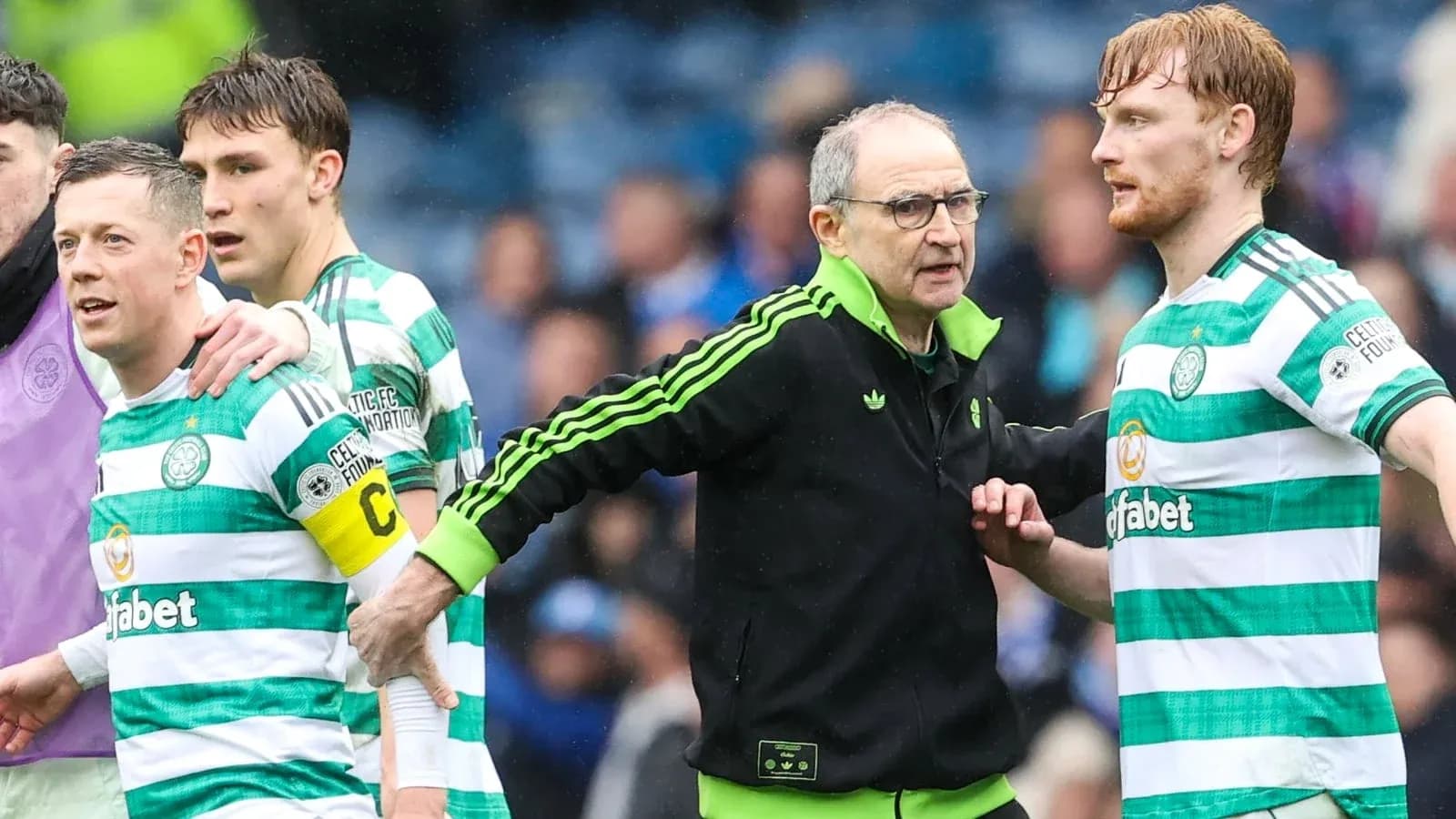 Celtic players and coach discussing during match Celtic players and coach discussing during match