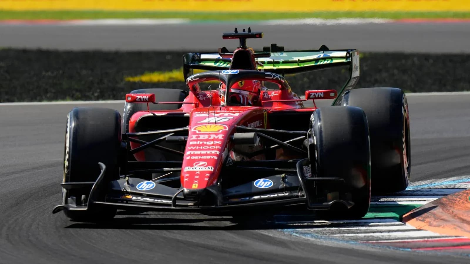 Ferrari F1 car racing on track during event Ferrari F1 car racing on track during event
