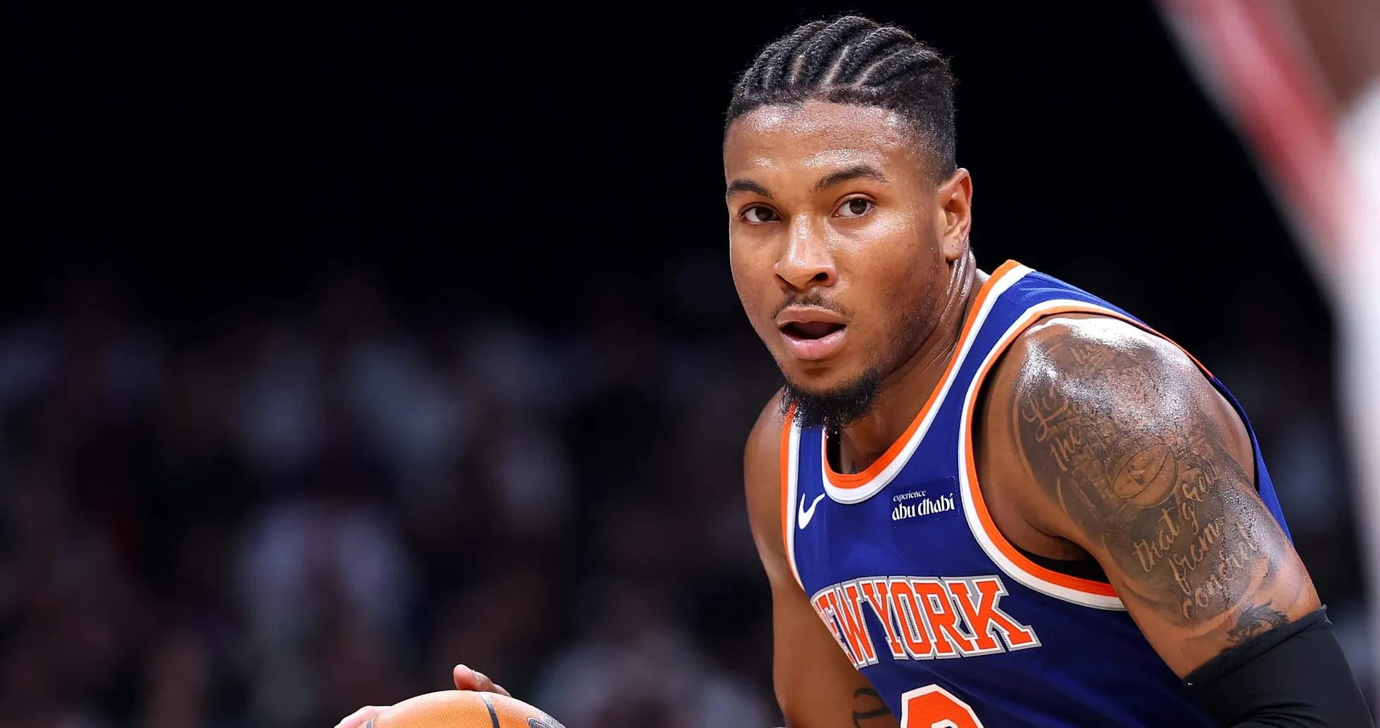 Basketball player dribbling ball during game Basketball player dribbling ball during game